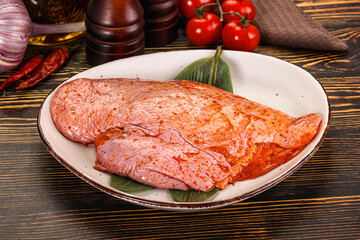 Raw marinated duck breast for cooking