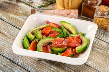Salad with avocado and salmon