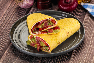 Burrito with tuna and vegetables wrap