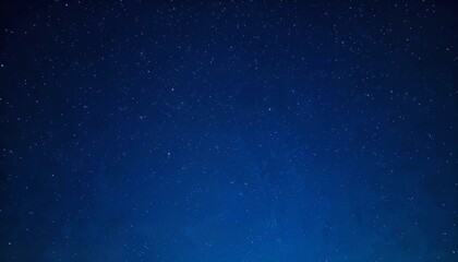Fototapeta premium Mesmerizing view of a deep blue starry night sky with countless twinkling stars