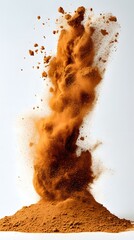 Eruption of Rich Brown Powder Against a Clean White Backdrop Creating Dynamic Abstract Art