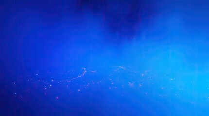 Fototapeta premium Abstract Blue Glow Background with Sparkling Particles