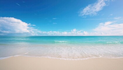 Fototapeta premium serene tropical beach with crystal clear turquoise water and white sand under a blue sky, ideal for travel promotions