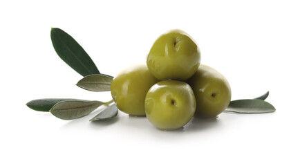 Delicious marinated green olives and leaves isolated on white