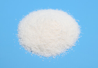 Alkylbenzene sulfonates powder on blue background