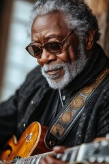 A seasoned blues musician with a weathered face and a soulful gaze strums his guitar. Dressed in black with a wide-brimmed hat, his presence exudes wisdom and deep musical heritage
