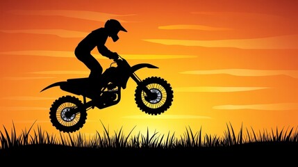 Fototapeta premium Silhouette of a Motocross Rider Jumping Against a Sunset Background