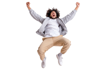 Cheerful man in grey jacket and beige pants jumping high with arms up, expressing happiness and excitement, wearing casual white sneakers, isolated on transparent background