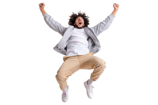Cheerful man in grey jacket and beige pants jumping high with arms up, expressing happiness and excitement, wearing casual white sneakers, isolated on transparent background - Powered by Adobe