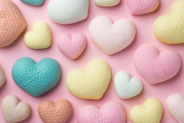 Colorful tiny hearts on pastel beige background. 