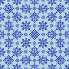 Seamless blue floral snowflake pattern for winter holiday decoration
