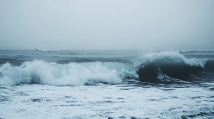 Naklejka premium Glacier calving into ocean waves, icy mist rising, symbolizing rapid ice loss and climate change.