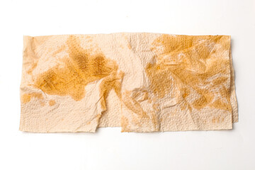 oil stains on kitchen tissue isolated on white background