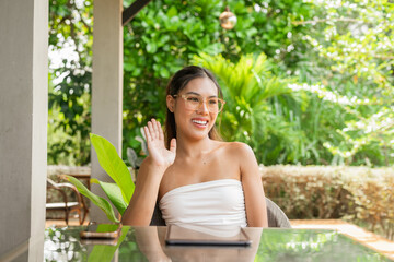 young woman in garden restaurant