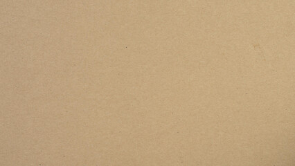 Abstract brown recycled paper background.
Old Kraft paper texture box craft stripes pattern.
top view.