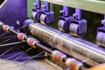 Production of polypropylene yarn for making bags.