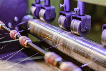 Production of polypropylene yarn for making bags.