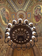 Obraz premium old clock in the church of st nicholas in prague