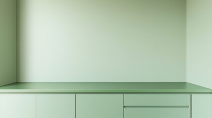 Empty green countertop against a matching green wall with subtle shadows