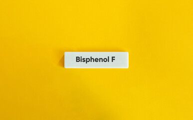 Bisphenol F, (BPF). Text on Block Letter Tile on Yellow Background. Minimal Aesthetic.