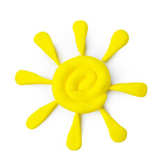 Sun made from play dough on white background, top view