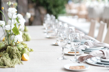 elegant dining tablescape including real fruit and flowers for luxury wedding