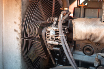 Ventilate fan part of the electricity  generator, using to cooling the temperature inside the machine. Industrial equipment object, close-up and selective focus. 