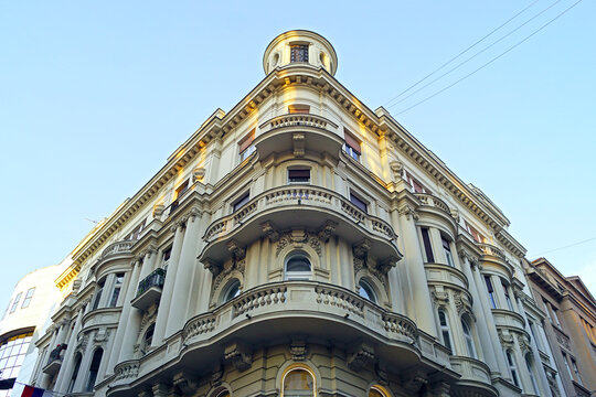 Historic architecture in the center of Belgrade, Serbia: photographed from bottom to top, a building with elegant decoration, built at the intersection of Zmaj Jovina and Knez Mihaila streets.