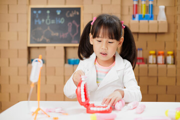 A young girl was conducting a science experiment at home.
