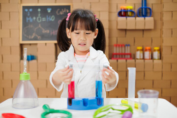 A young girl was conducting a science experiment at home.