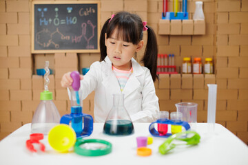 A young girl was conducting a science experiment at home.