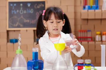 A young girl was conducting a science experiment at home.