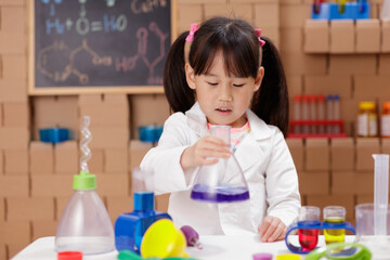A young girl was conducting a science experiment at home.