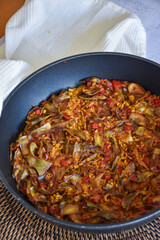 rice paella with artichokes and vegetables