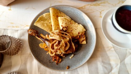 Duck with cabbage and potato pancakes is a traditional Czech dish often served on festive...