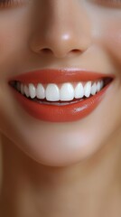 Fototapeta premium close up of smiling woman with bright white teeth and glossy reddish orange lipstick dental health and beauty