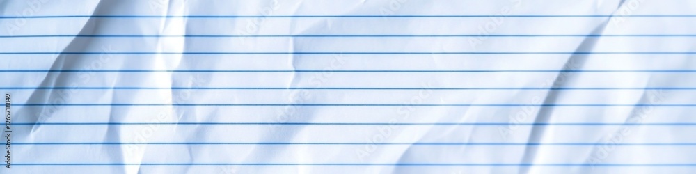 Poster a close-up shot of a blank sheet of paper with evenly spaced lines, ideal for use in educational or 