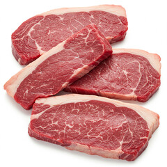 Fototapeta premium Four raw beef steaks with marbled fat.