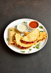 Quesadillas with fresh vegetables served with sauce