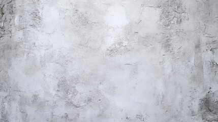 Obraz premium A close-up view of a textured white concrete wall, showcasing subtle variations and patterns in the surface, creating a clean and modern aesthetic.