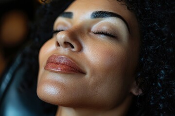 A beautiful American woman with curly hair at a cosmetologist's procedure. large portrait of a woman
