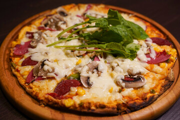 Cheese, sausage and mushroom pizza