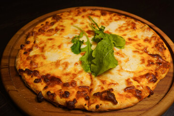 pizza on a wooden board