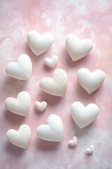 Obraz premium Pink heart-shaped decorations with holes in the center.