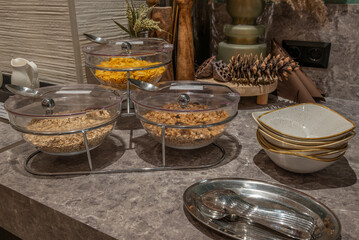 Breakfast Buffet with Cereal, Granola, and Cornflakes
