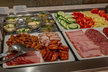 Buffet Platter with Cold Cuts, Spreads, and Fresh Vegetables
