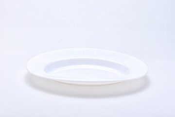 Long and empty white plate isolated on white background