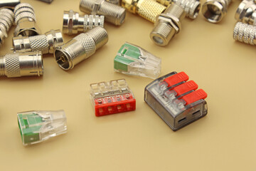 Metal F-connectors for connecting coaxial cables. Close-up. 