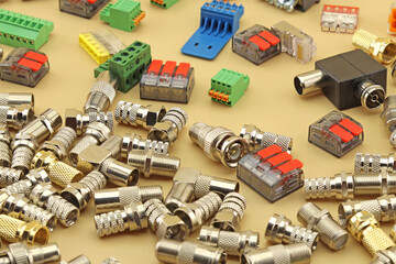 Metal F-connectors for connecting coaxial cables. Close-up. 