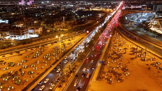 Nighttime Aerial View of Riyad City Lights and Highways. KAFD